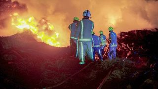 Firefighters from various stations tackle a huge blaze at a tyre storage facility in central Bradford.