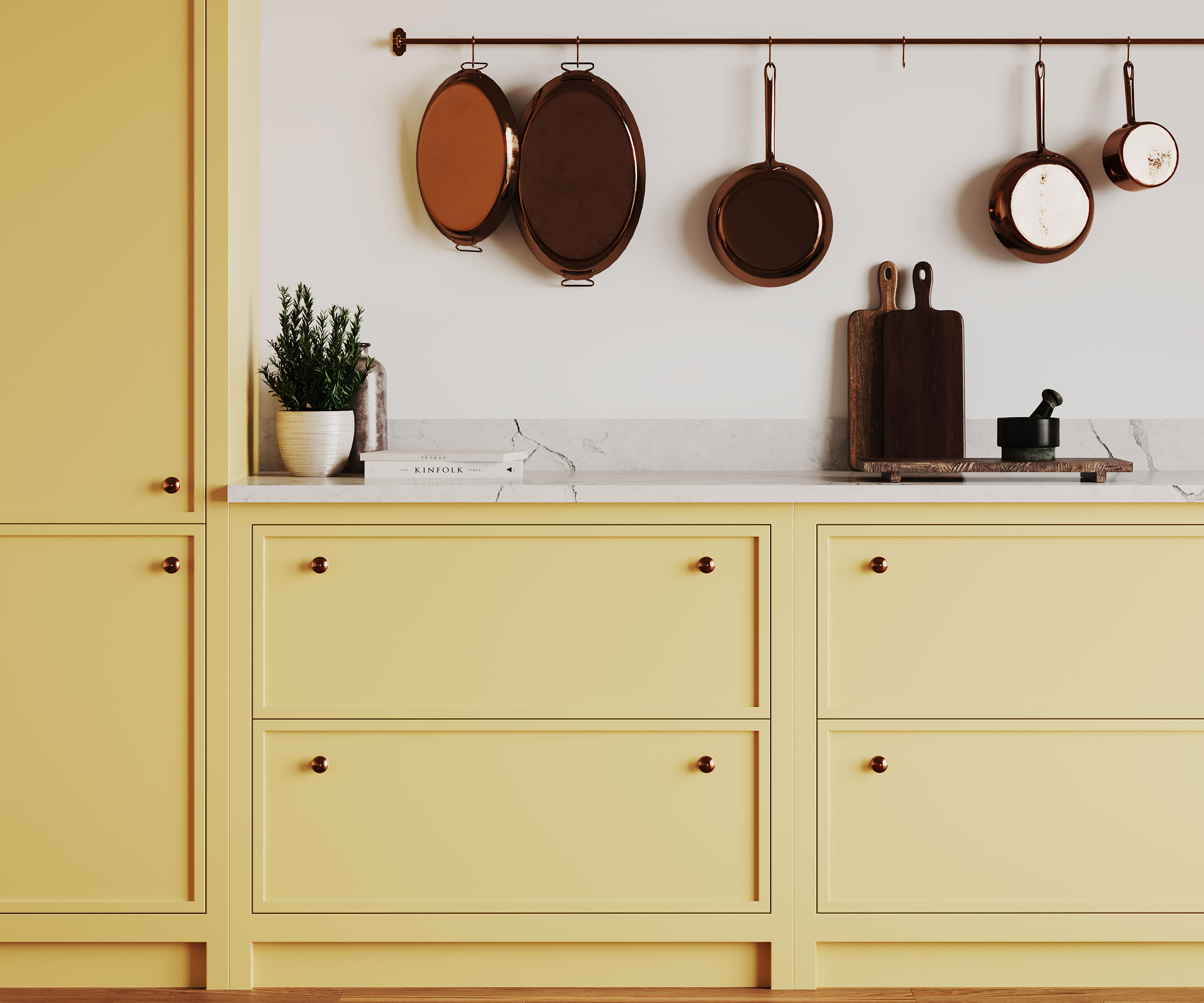 pale yellow slim Shaker kitchen with composite marble worktop and hanging pot rails