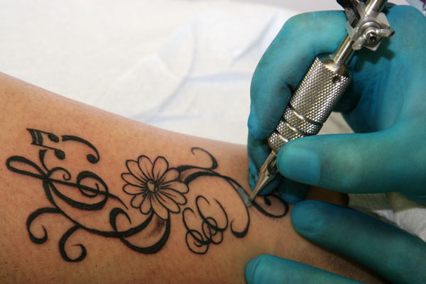 Woman Sues Black Ink Studio for Infected Tattoo  The Source