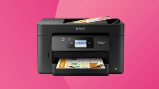 Epson printer on a pink background