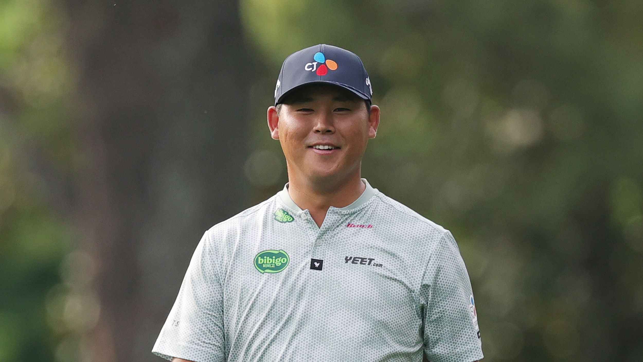 Si Woo Kim smiles during round two of the 2025 PGA Championship