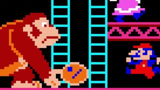 Donkey Kong rolls a barrel at Mario.