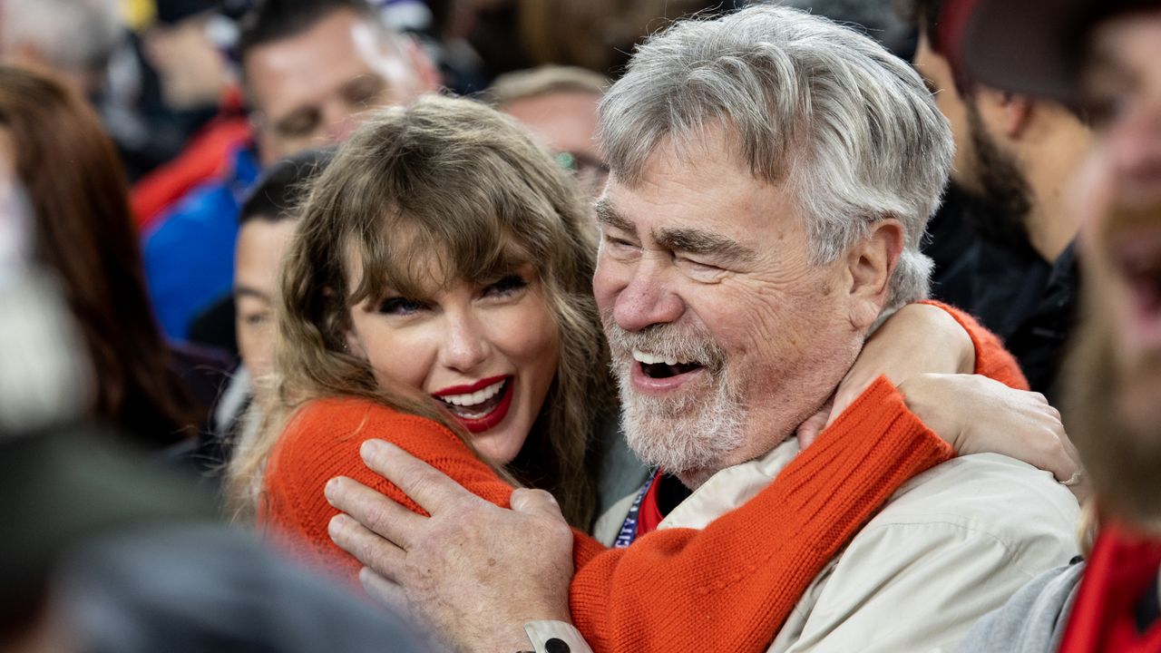 Taylor Swift hugs Ed Kielce after the AFC Championship NFL football game between the Kansas City Chiefs and Baltimore Ravens at M&amp;T Bank Stadium on January 28, 2024 in Baltimore, Maryland. 