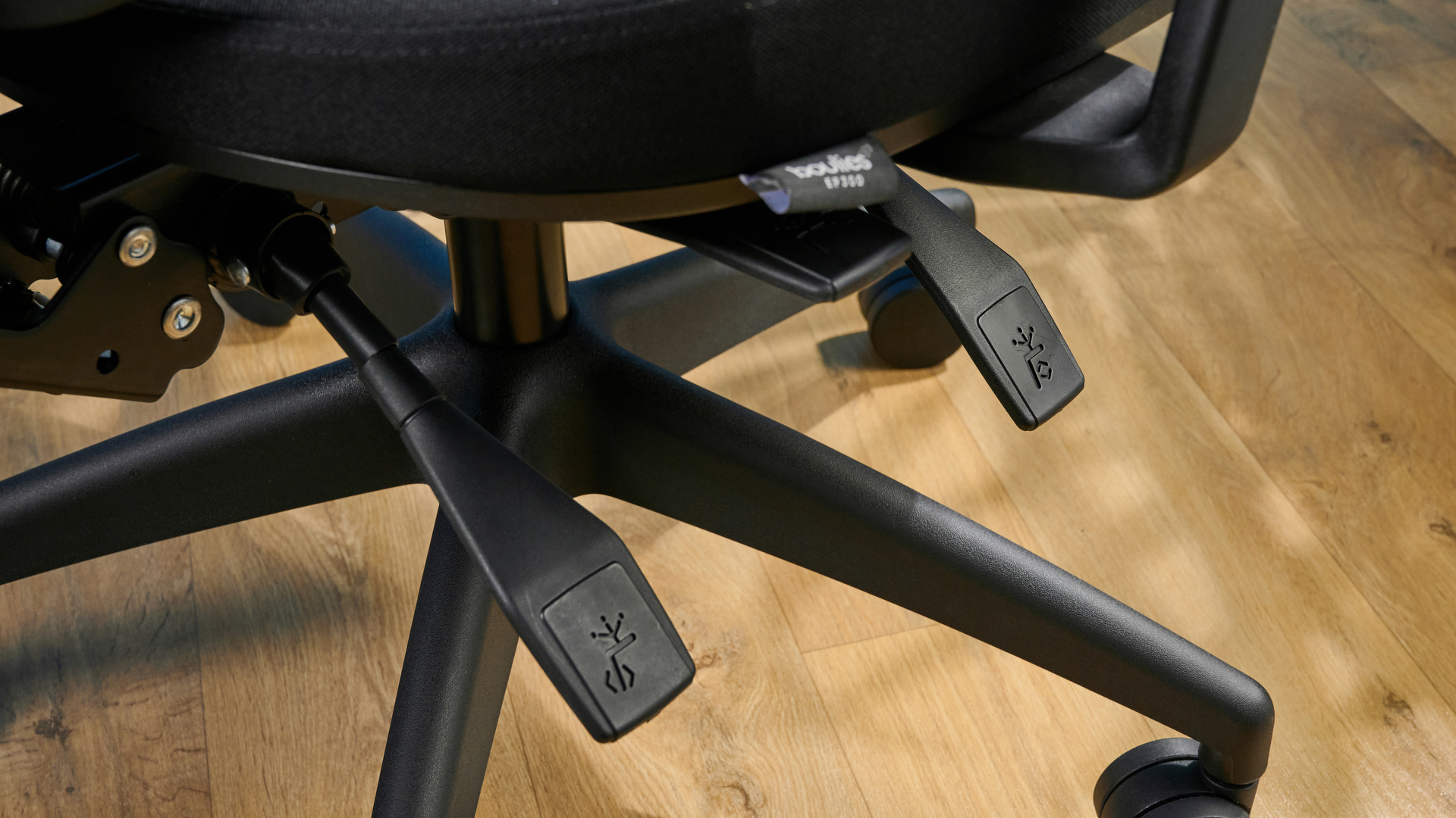 A black Boulies OP300 ergonomic office chair