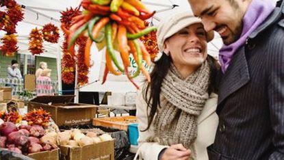 man and woman at farmers market