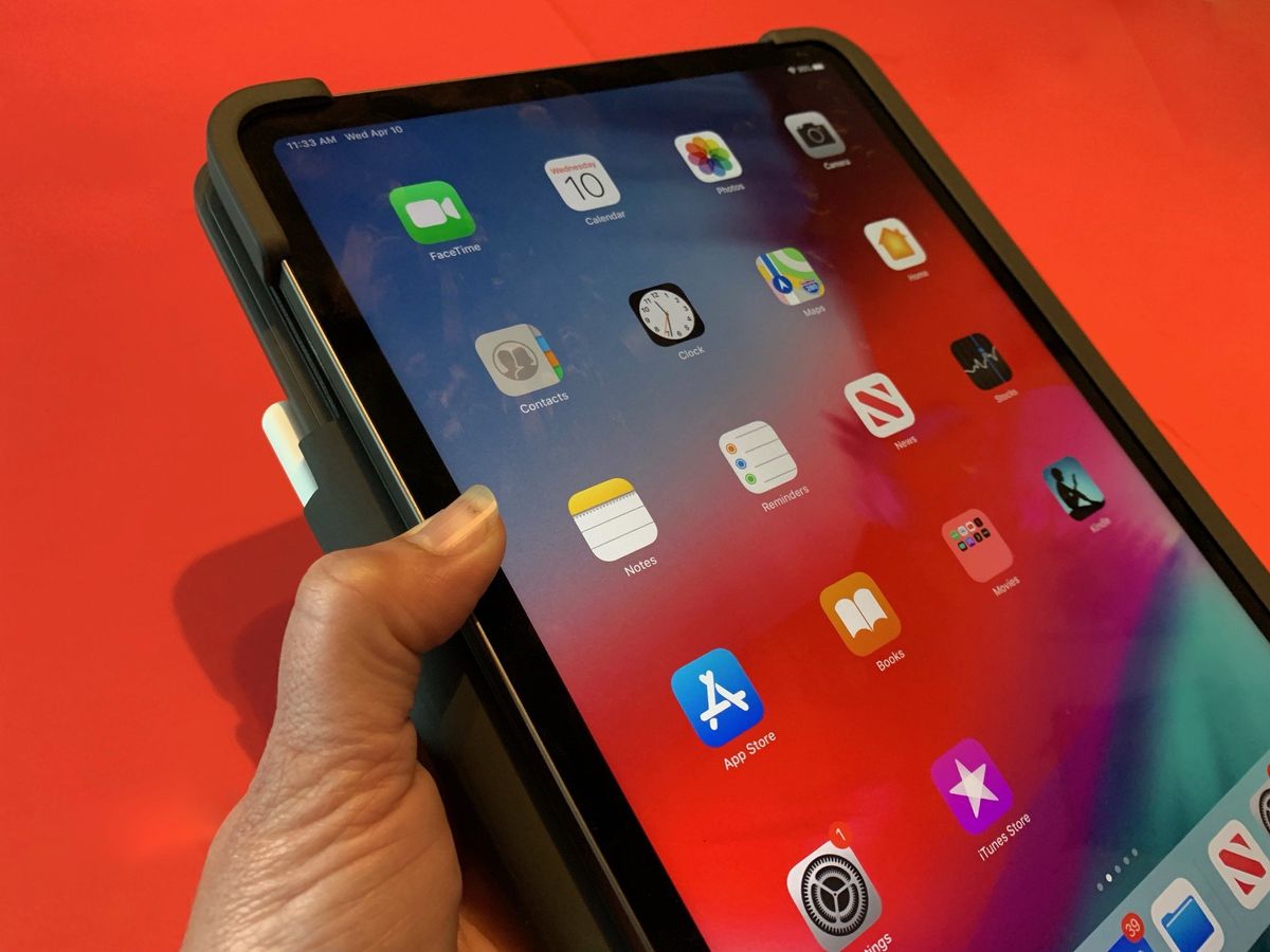 Holding Logitech the Folio Slim Pro in tablet mode
