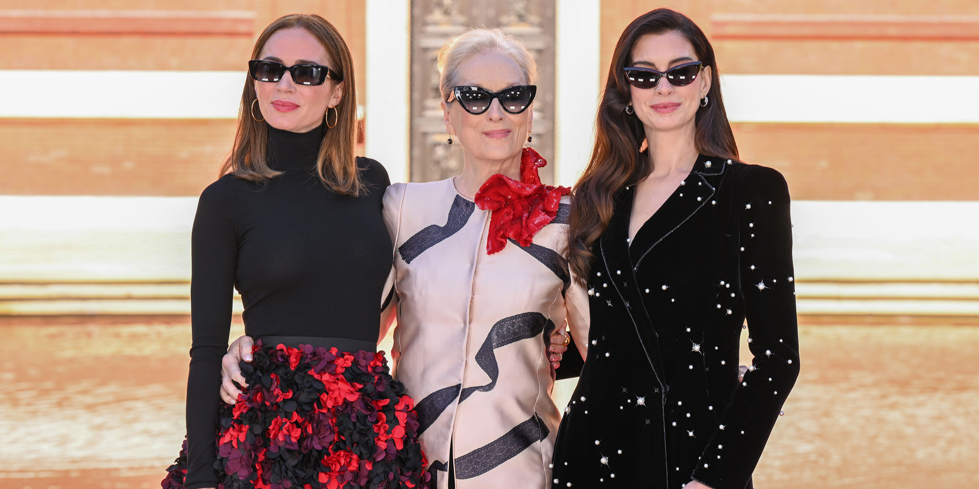 Meryl Streep poses with Anne Hathaway and Emily Blunt