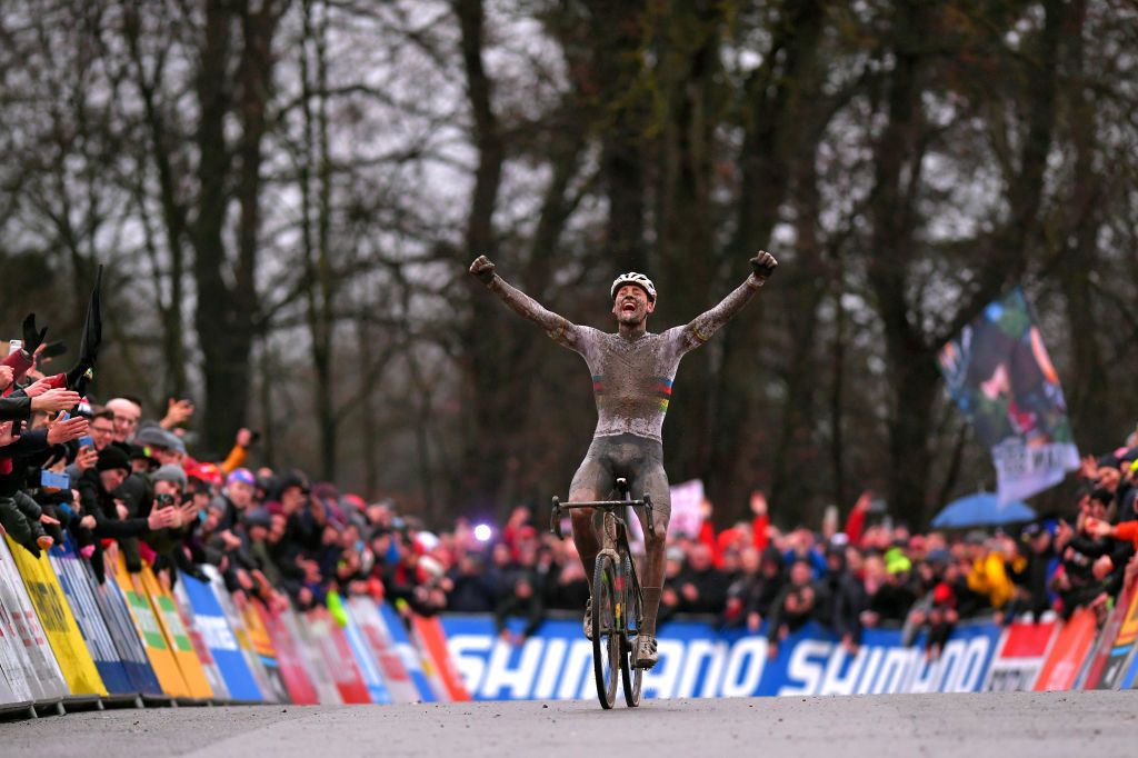 NAMUR BELGIUM DECEMBER 22 Arrival Mathieu Van Der Poel of The Netherlands and Team Corendon Circus Celebration Mud during the 11th Namur World Cup 2019 UCICX TelenetUCICXWC on December 22 2019 in Namur Belgium Photo by Luc ClaessenGetty Images