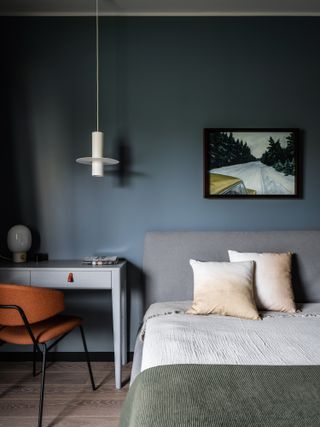 A blue toned bedroom