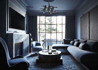 a dark blue minimalist living room
