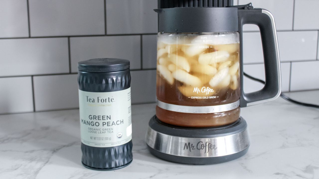 Mr. Coffee Perfect Brew Coffee Maker with a carafe of iced tea