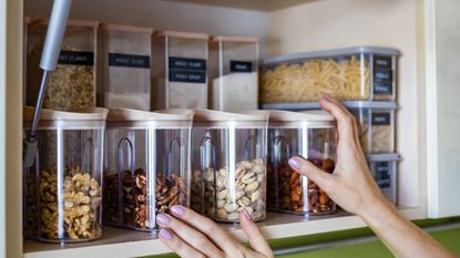 Organizing a cupboard with containers