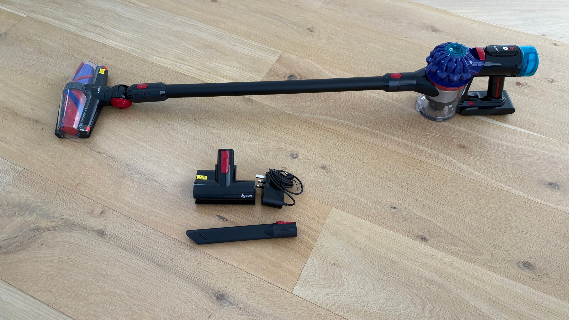 Testing the Dyson V10 Konical Cordless Vacuum showing it vacuuming the floor