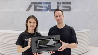 Der8auer and Asus' Jolene Lee holding the Asus ROG Matrix GeForce RTX 4090.