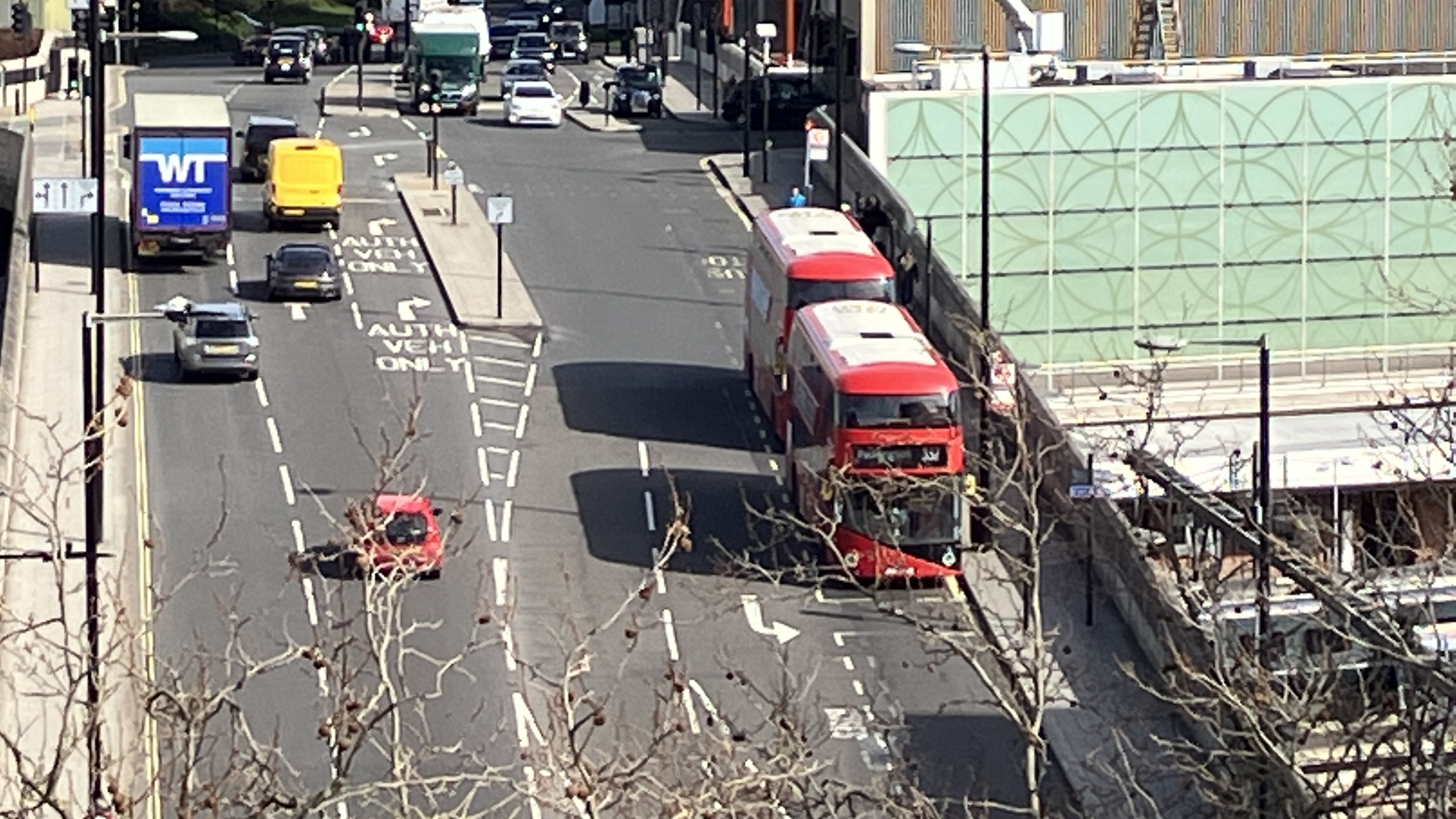 Long shot and close up of bus in daylight