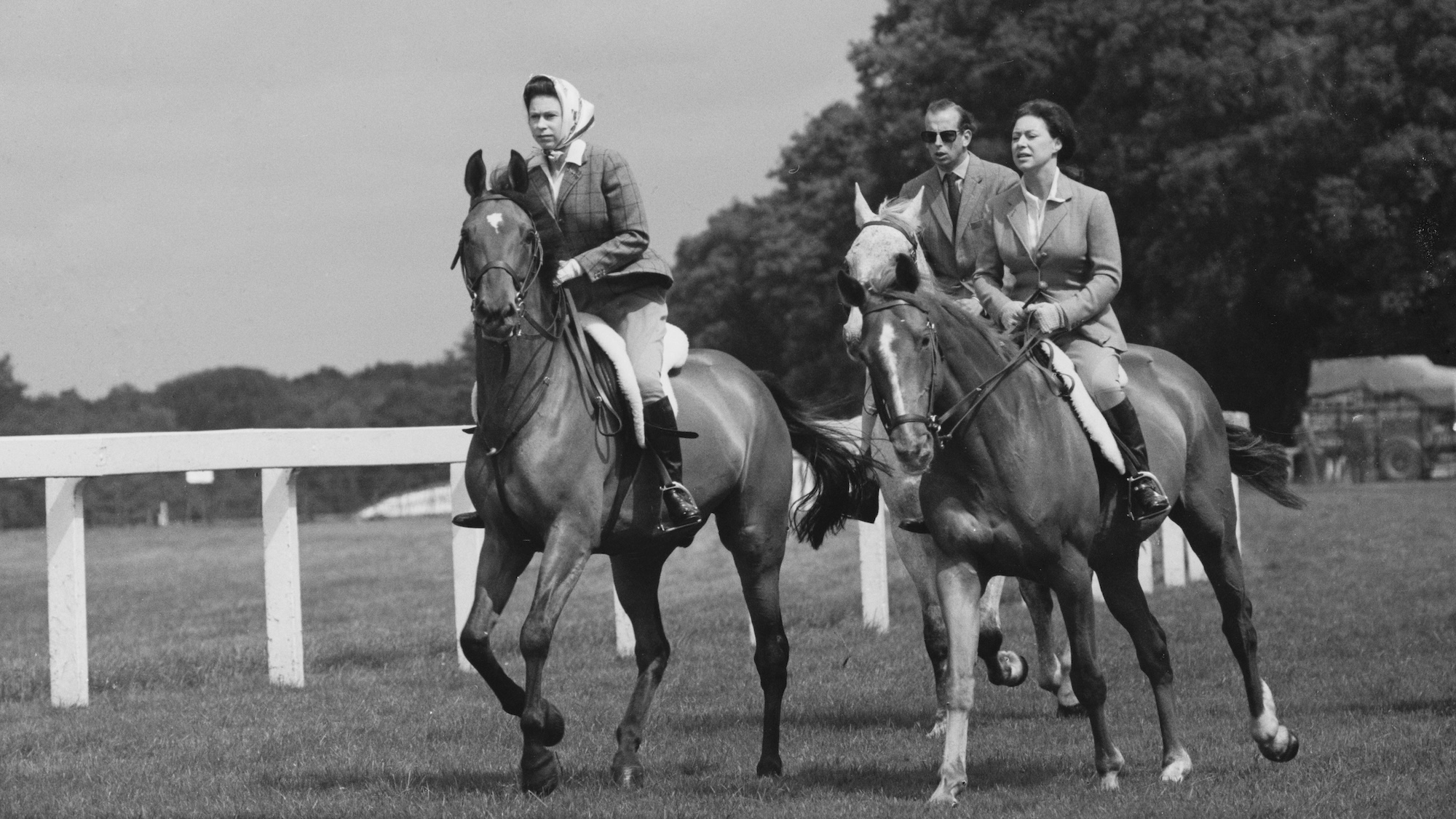Queen Elizabeth II, Princess Margaret, Countess of Snowdon (1930 - 2002), and Prince Edward, Duke of Kent, riding at Ascot Racecourse, UK, 27th June 1968.