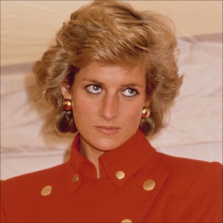 Diana, Princess of Wales (1961 - 1997) wearing a red suit by Catherine Walker during a visit to Pudsey in West Yorkshire, UK, July 1989