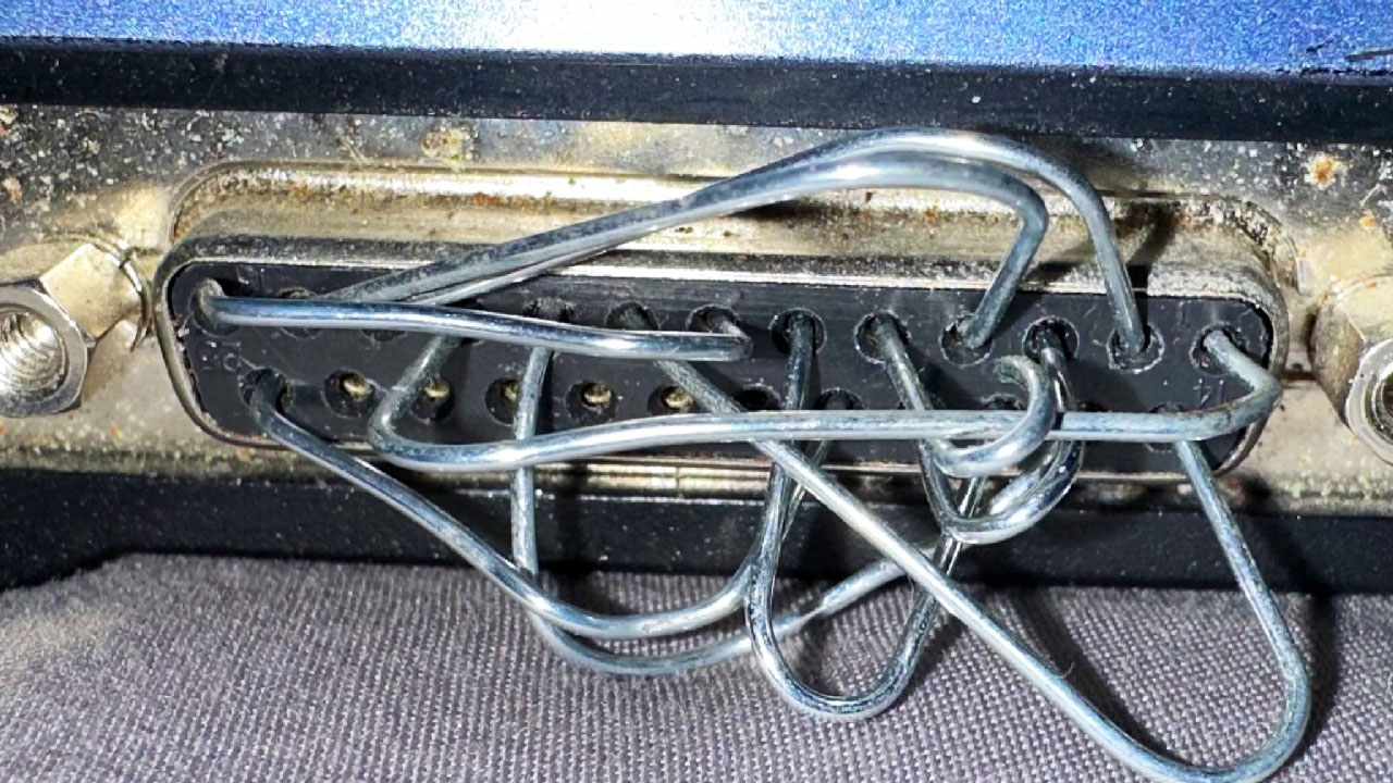 Laptop BIOS password reset technique uses contorted paperclips stuffed into a parallel port