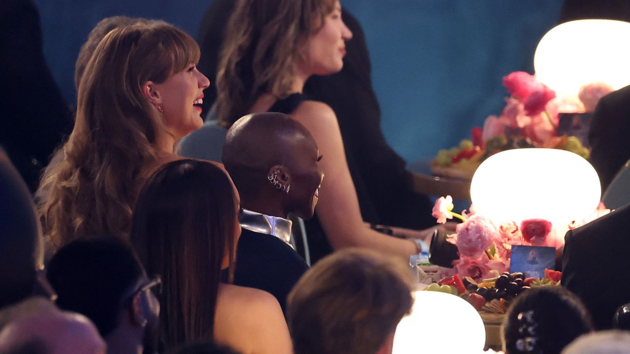 Taylor Swift and Cynthia Erivo sitting together at the 2025 Grammys.