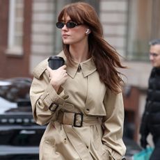 Daisy Edgar-Jones was spotted during London Fashion Week wearing a Burberry trench coat and the straight-leg jeans trend