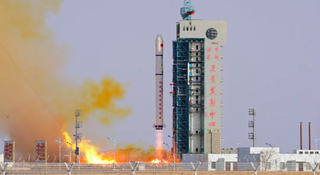 A Chinese Long March 2D rocket launches from Jiuquan Satellite Launch Center in the Gobi Desert on Jan. 13, 2023, carrying the Yaogan 37 and Shiyan 22A and B satellites into orbit