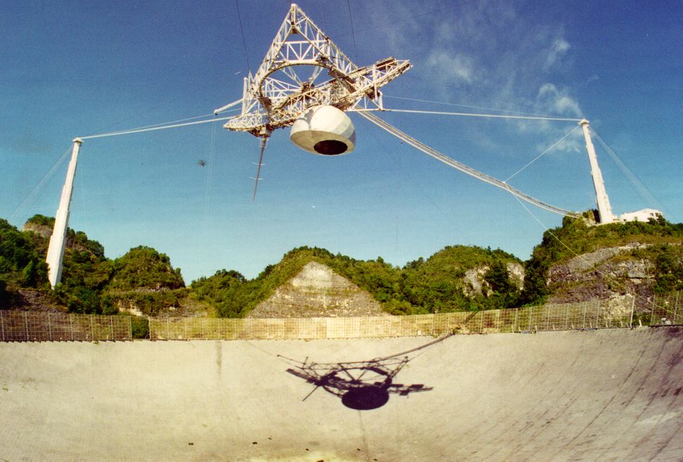 The Arecibo radio telescope's massive hanging platform has collapsed