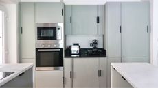 Painted kitchen cabinets in white