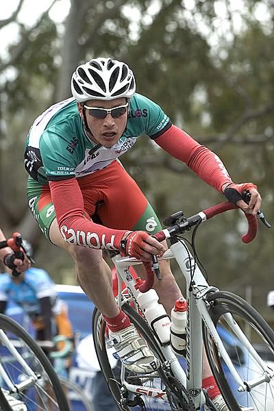 Tasmanian strong-man William Clarke (Praties) leans into a bend in his Tasco Sprint leader's green jersey.