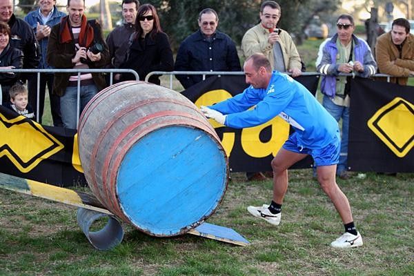Paolo Bettini gets it rolling along.