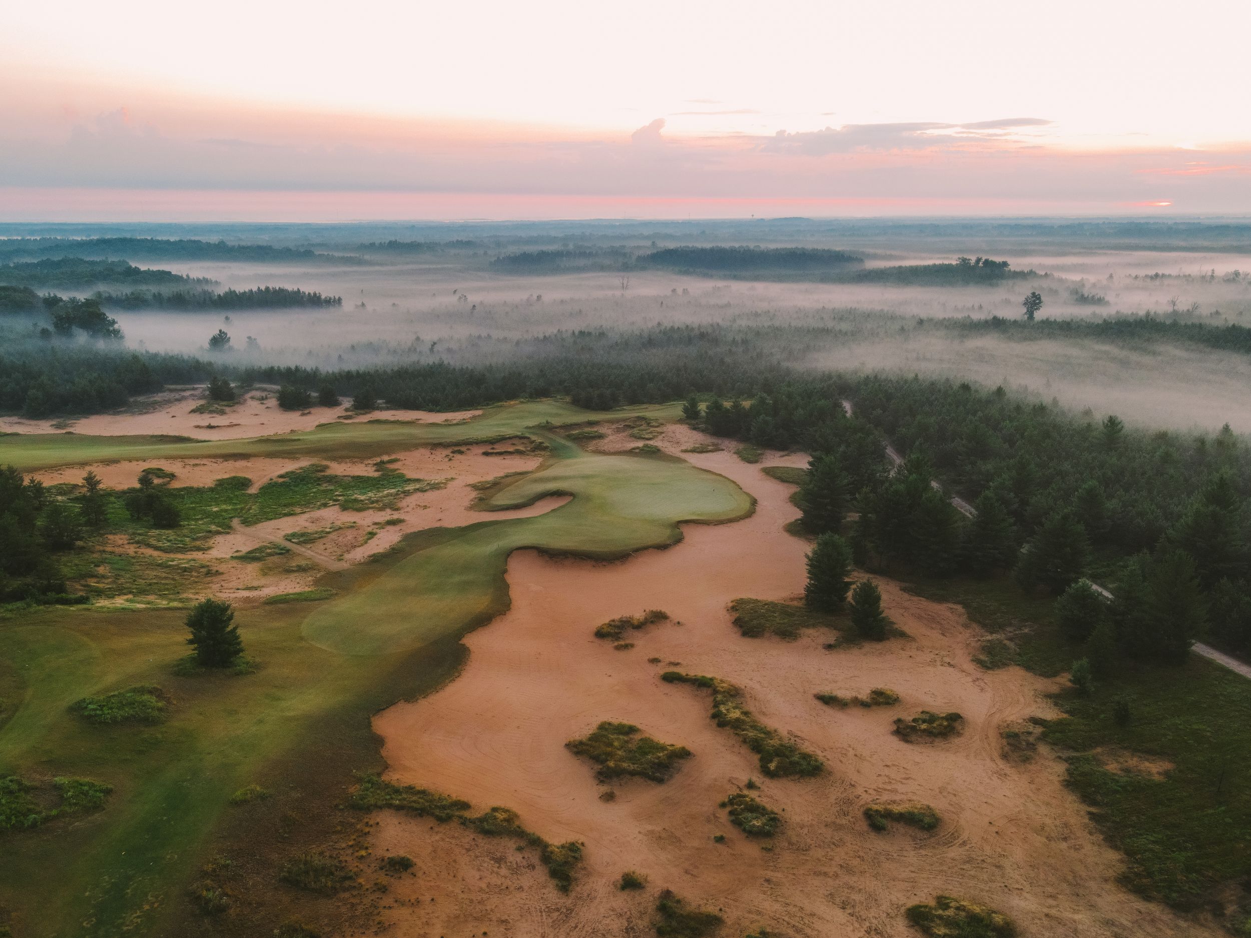 Sand Valley Resort from the sky in the morning mist.