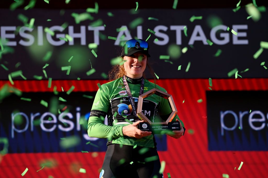 ABU DHABI UNITED ARAB EMIRATES FEBRUARY 12 Charlotte Kool of The Netherlands and Team DSM celebrates at podium as Green Points Jersey winner during the 1st UAE Tour Women 2023 Stage 4 a 119km stage from Fatima Bint Mubarak Ladies Sports Academy to Abu Dhabi Breakwater UAETourWomen UCIWWT on February 12 2023 in Abu Dhabi United Arab Emirates Photo by Tim de WaeleGetty Images