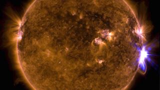 The bright flash of a solar flare captured by NASA's Solar Dynamics Observatory.