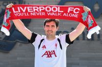 Andoni Iraola, the new manager for English Premier League football side Liverpool, poses as he meets the media at the team's training ground in Kirkby, Liverpool, north-west England on July 13, 2026.