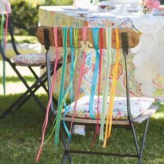 chair with colourful ribbons and flowers