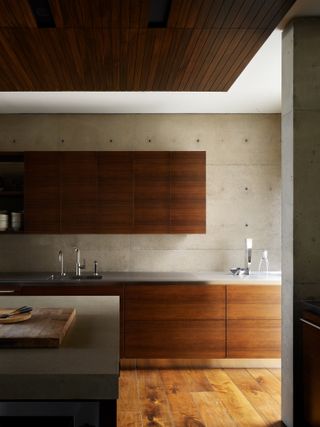 Streamlined, dark wood kitchen