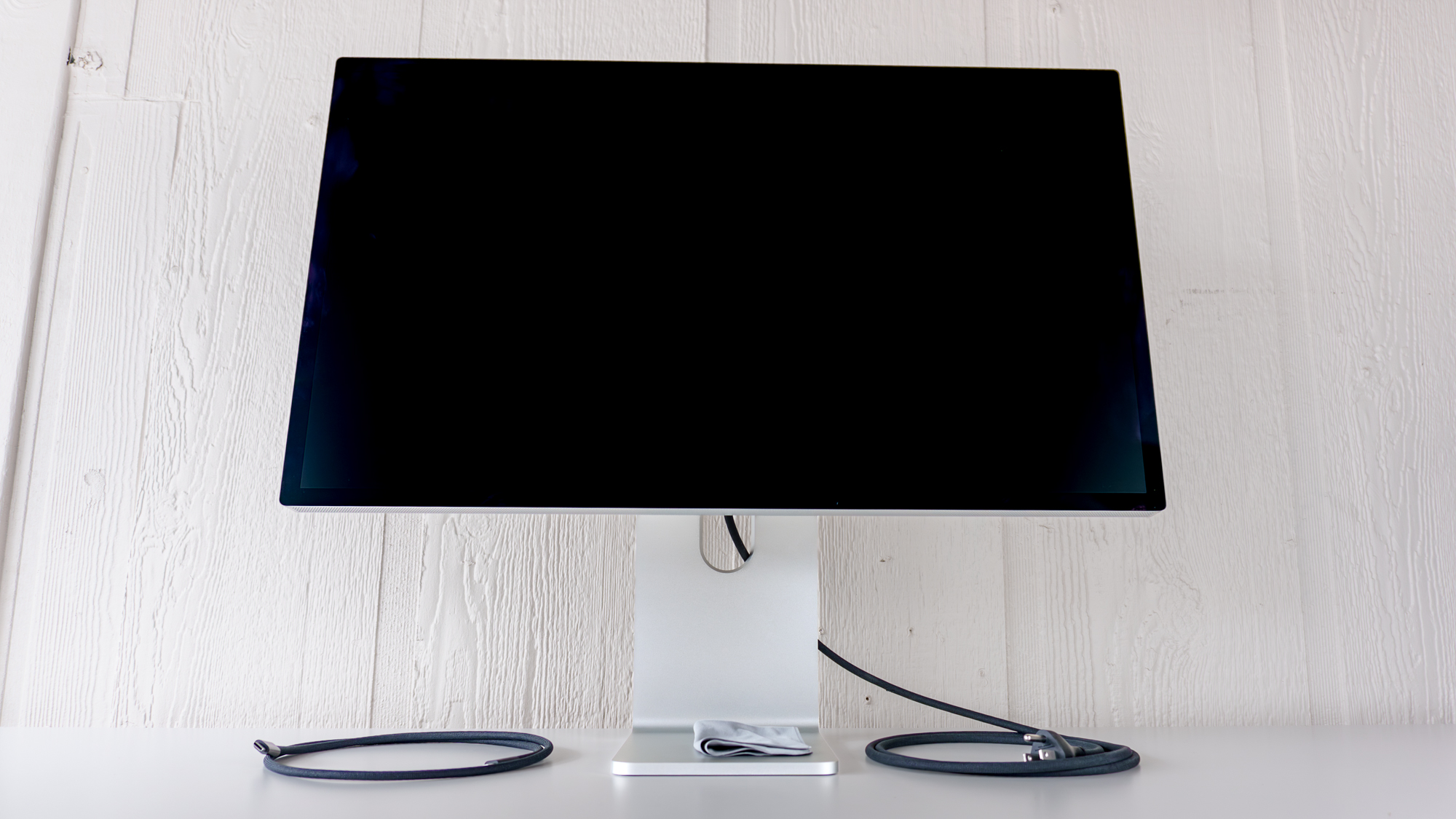 The Apple Studio Display XDR unboxed on a table