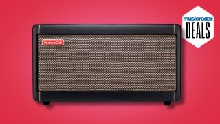 A Positive Grid Spark 40 guitar amp on a red background