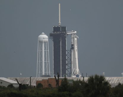 The SpaceX Falcon 9 rocket with the Crew Dragon spacecraft attached sits on launch pad 39A at the Kennedy Space Center on May 27, 2020 in Cape Canaveral, Florida
