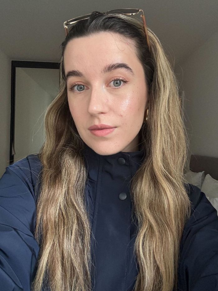 Junior beauty editor Grace Lindsay after applying the Victoria Beckham Reflect Highlighter Stick