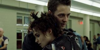 Marla Singer and The Narrator embrace in Fight Club