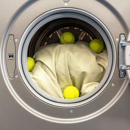 tennis balls with bedding in tumble dryer