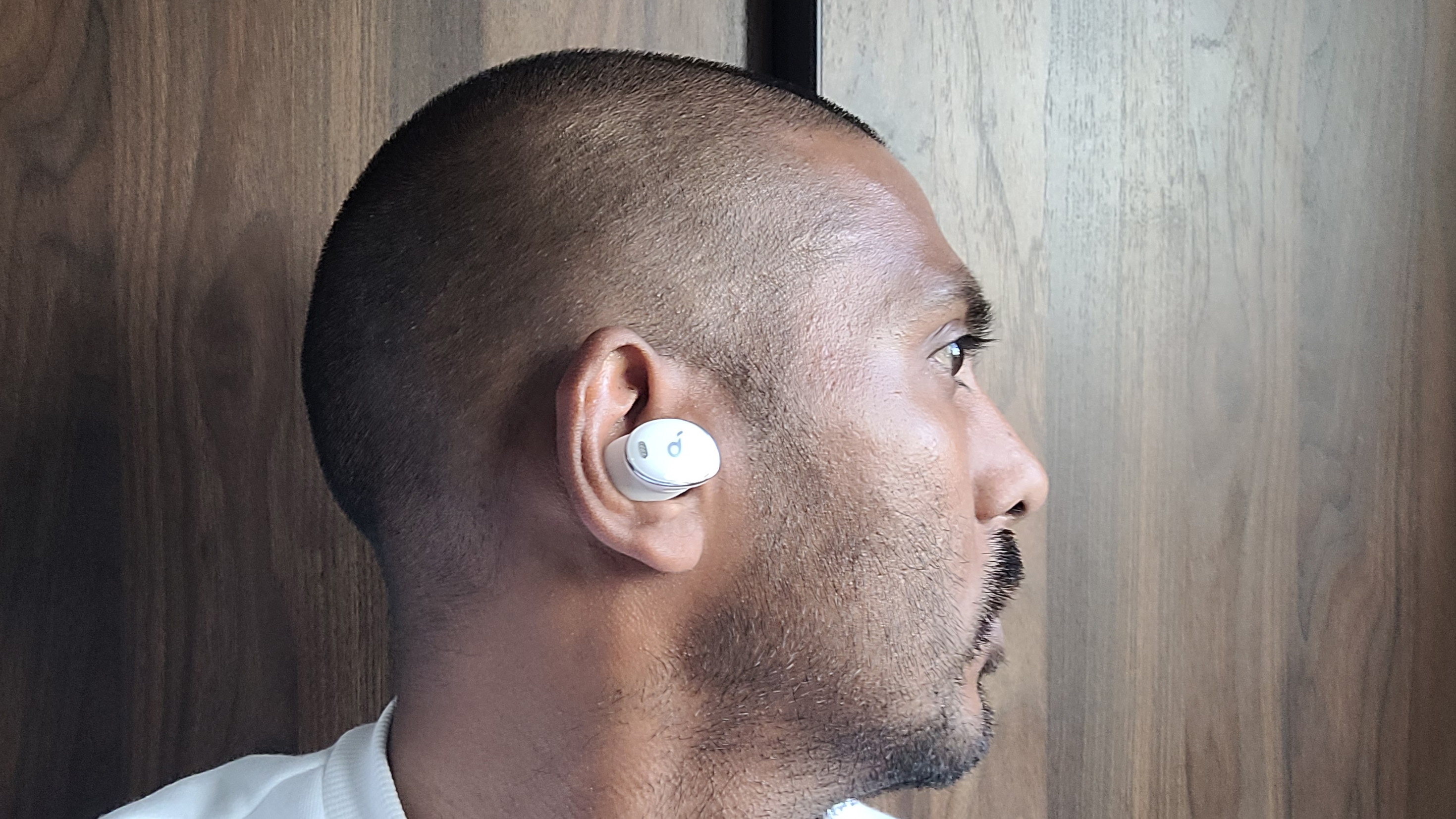 a man wearing the anker soundcore liberty 3 pro