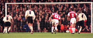 Robbie Fowler’s penalty was saved by Davis Seaman but Jason McAteer scored the rebound