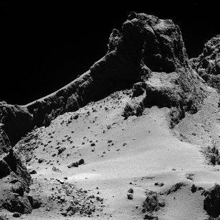 Part of Comet 67P/Churyumov-Gerasimenko, as seen by the Rosetta spacecraft about 4.9 miles (8 kilometers) from the surface.