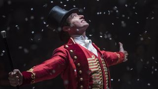Hugh Jackman stands on stage as P.T. Barnum in The Greatest Showman