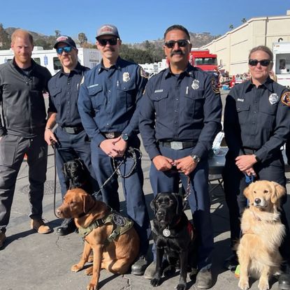 Prince Harry meets firefighters and therapy dogs from Salinas Fire Department