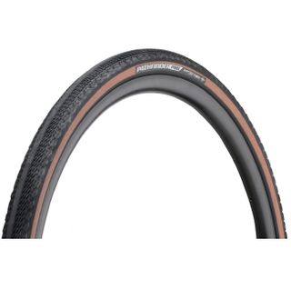 A tan bicycle tyre on a white background