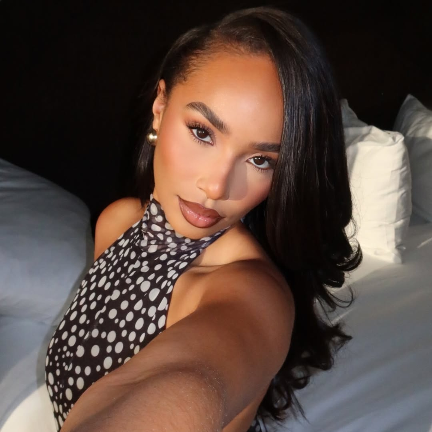 Symphani Soto wears a subtle cat eye.