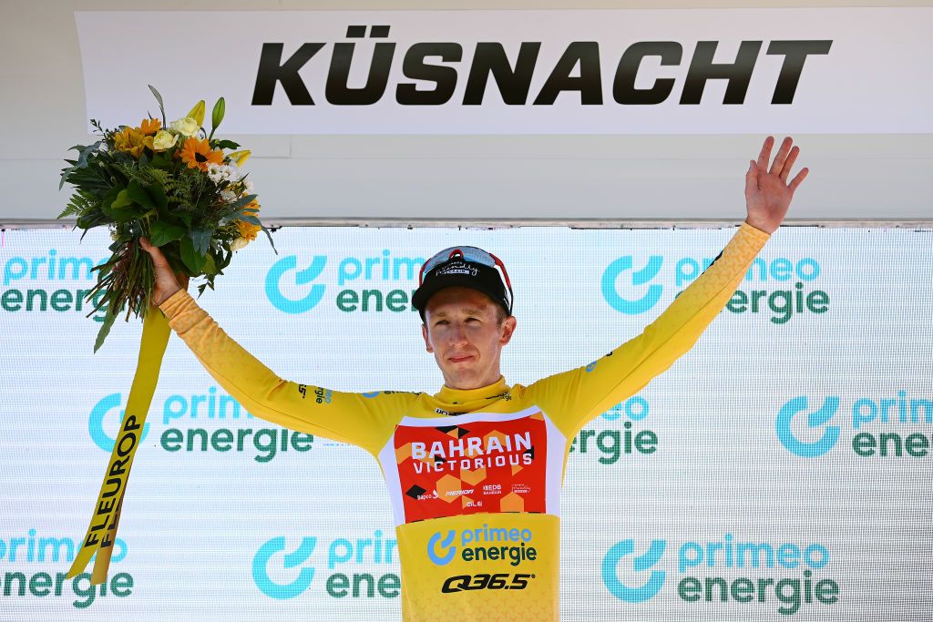 KUSNACHT SWITZERLAND JUNE 12 Stephen Williams of United Kingdom and Team Bahrain Victorious celebrates winning the yellow leader jersey on the podium ceremony after the 85th Tour de Suisse 2022 Stage 1 a 1776km stage from Kusnacht to Kusnacht 679m ourdesuisse2022 WorldTour on June 12 2022 in Kusnacht Switzerland Photo by Tim de WaeleGetty Images