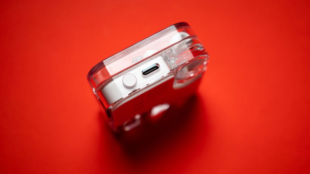 Nothing Ear (2) earbuds review on red background